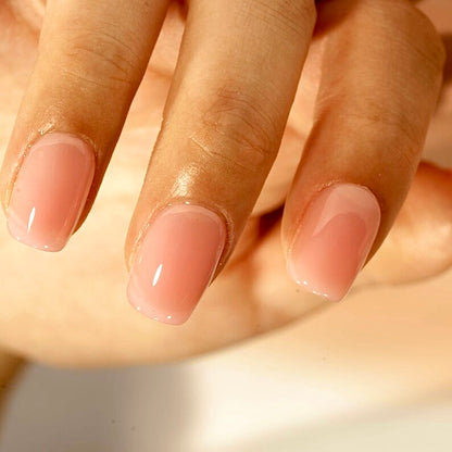 Hand showing Decode beauty warm nude builder gel press on nails